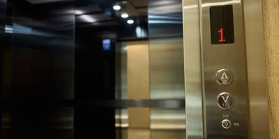 Dog found huddled in lift and his heartbreaking state moves rescuers
