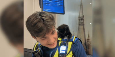 British Transport Police officer with a black and white kitten