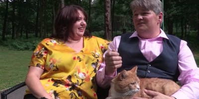 Couple with a ginger cat
