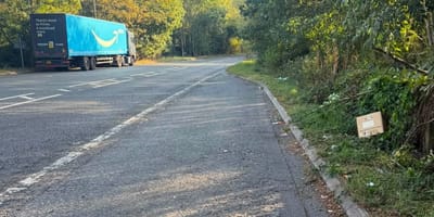 A lorry and a cardboard box