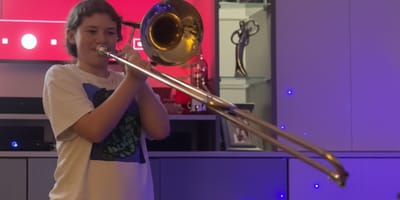A girl playing the trombone
