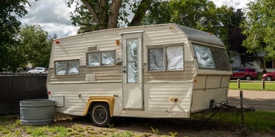 An old caravan on a plot of land