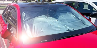 A car parked in the sun