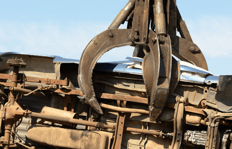 Cars crushed at auto salvage