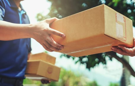 A woman dropping off a parcel