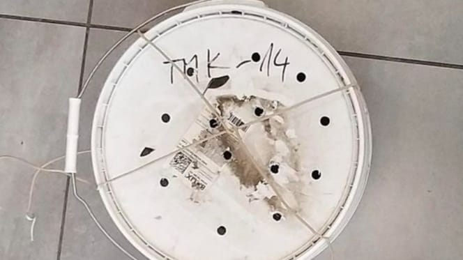 Auf dem Friedhof gefundene Farbdose