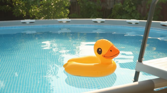 A swimming pool with a pool float