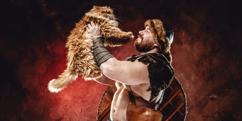 un vikingo con su gato